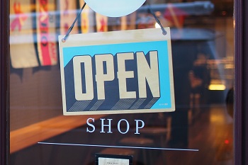 open sign in storefront